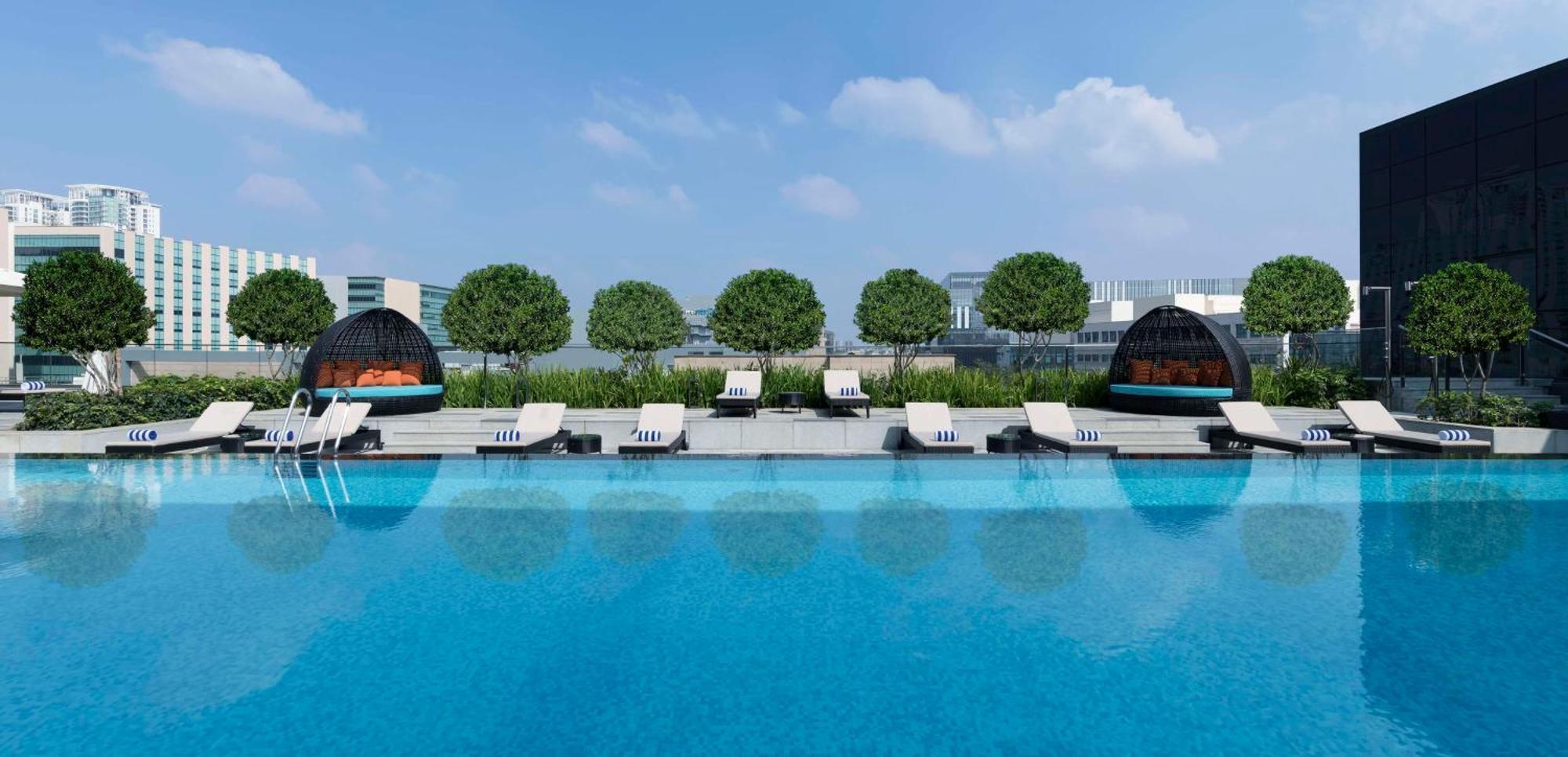 Hilton Bengaluru Embassy Manyata Business Park Hotel Exterior foto